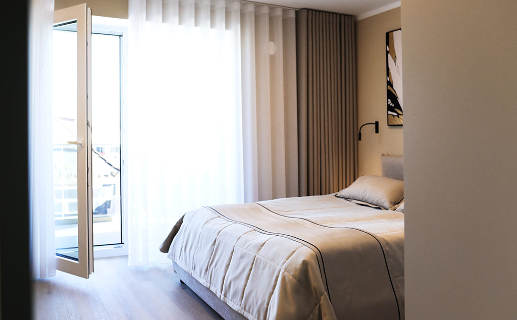Lehmann Apartment 2 Zimmer mit Balkon Schlafzimmer